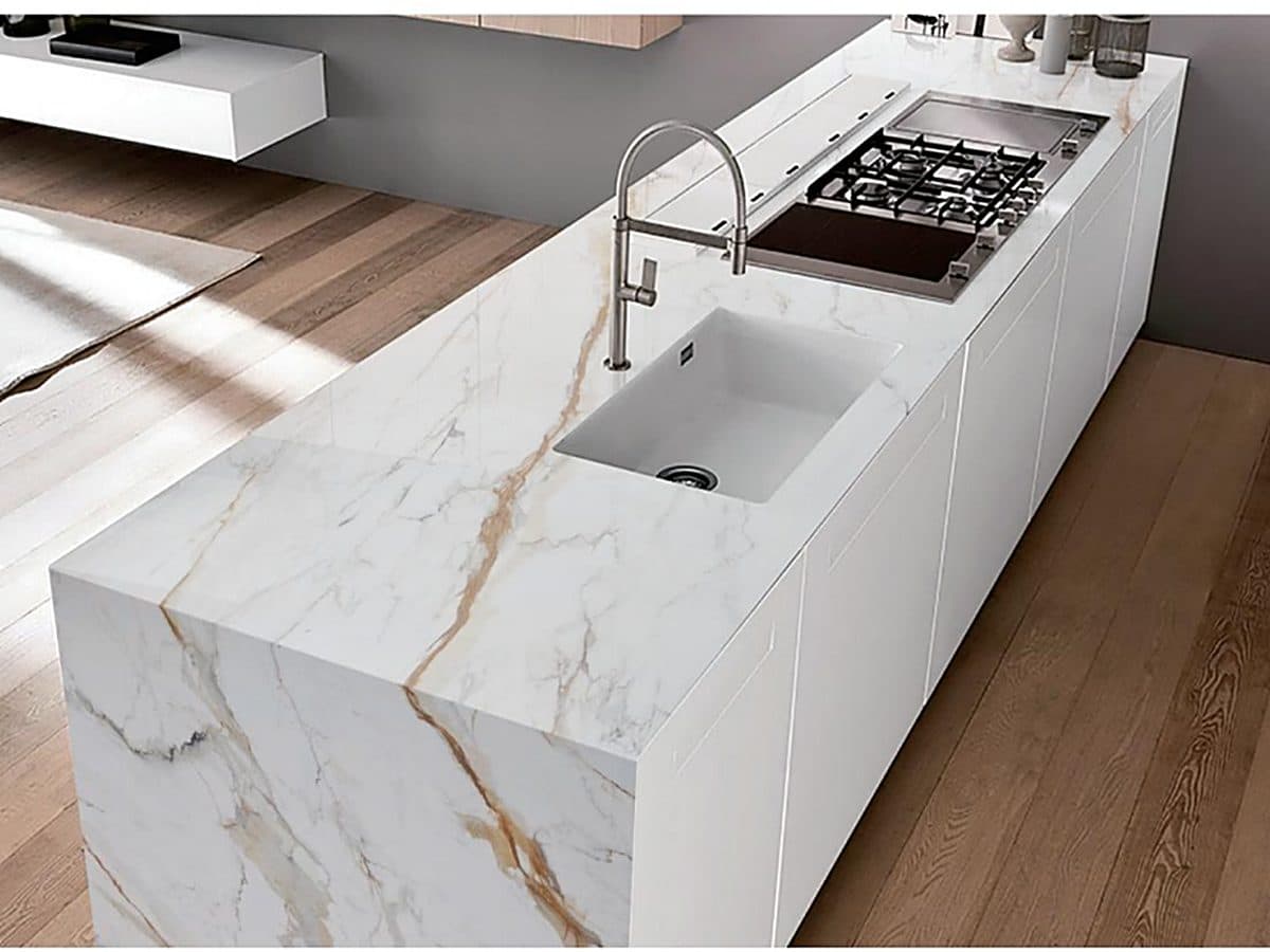 Waterfall island with integrated sink and cooktop